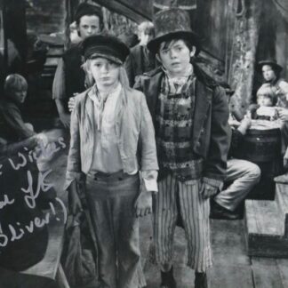 Mark Lester in his role as Oliver Twist in the 1968 musical Oliver - signed photo 10" x 8" with COA