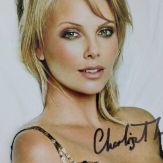 Charlize Theron - autographed photo 6" x 4"