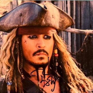 Johny Depp as Jack Sparrow in Pirates of the Caribbean signed 10" x 8" photo - with COA