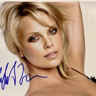 Charlize Theron - autographed photo 10" x 8"
