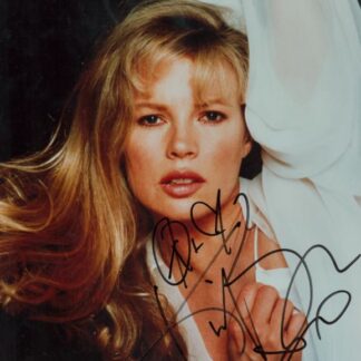 Kim Basinger – known as Domino Petachi in James Bond – signed 10" x 8" color photo with COA