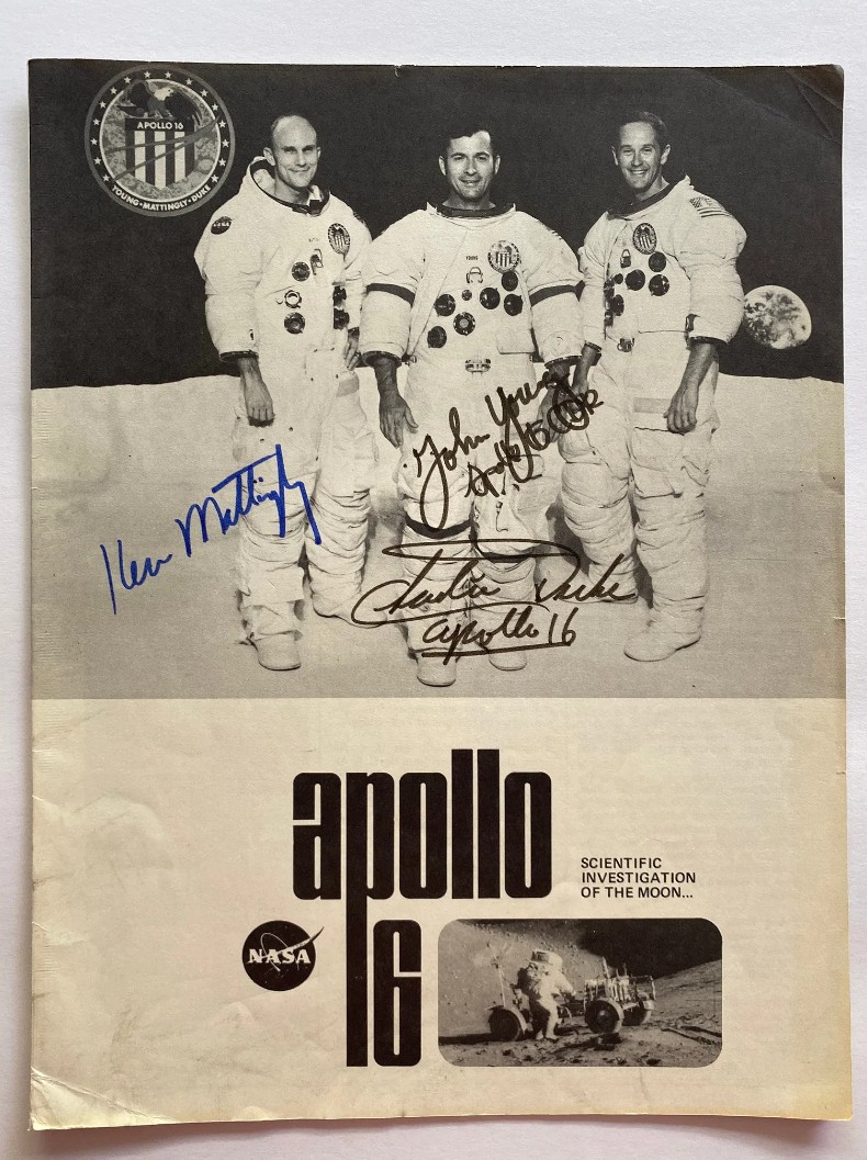 Apollo 16 Press Kit - Triple signed by Ken Mattingly, John Young, and Charlie Duke - historic NASA collectible