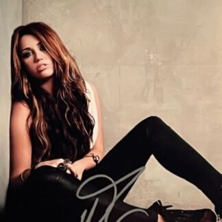 Miley Cyrus – signed 10"x8" photo with COA