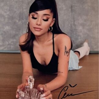 Ariana Grande. Signed 10"x8" photo with COA