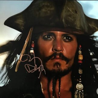 Johnny Depp as Jack Sparrow in Pirates of the Caribbean – signed 10"x8" photo with KB COA