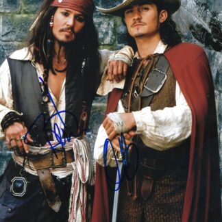 Orlando Bloom & Johnny Depp as Will Turner and Captain Jack Sparrow in Pirates of the Caribbean – double signed 10"x8" photo with COA