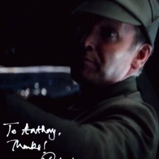 Rufus Wright as Syril Karn's Father in Star Wars