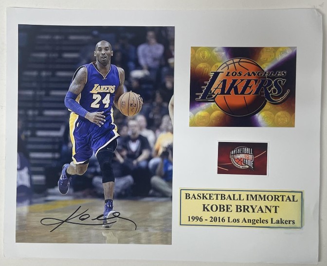 Kobe Bryant – signed photo mounted to 8" x 10" with Heroes & Legends COA