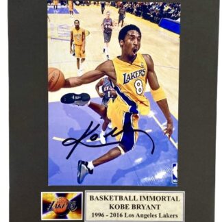 Kobe Bryant Basketball immortal – signed Lakers photo mounted to 8" x 10" with Heroes & Legends COA